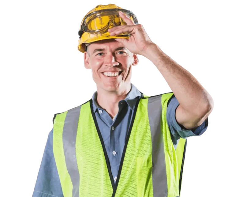 Pan w kamizelce i kasku ochronnym